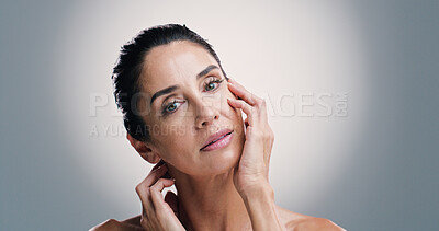 Buy stock photo Beauty, cosmetics and portrait of woman on studio space for antiaging treatment or wellness routine. Aesthetic, dermatology and skincare with mature person on gray background for transformation