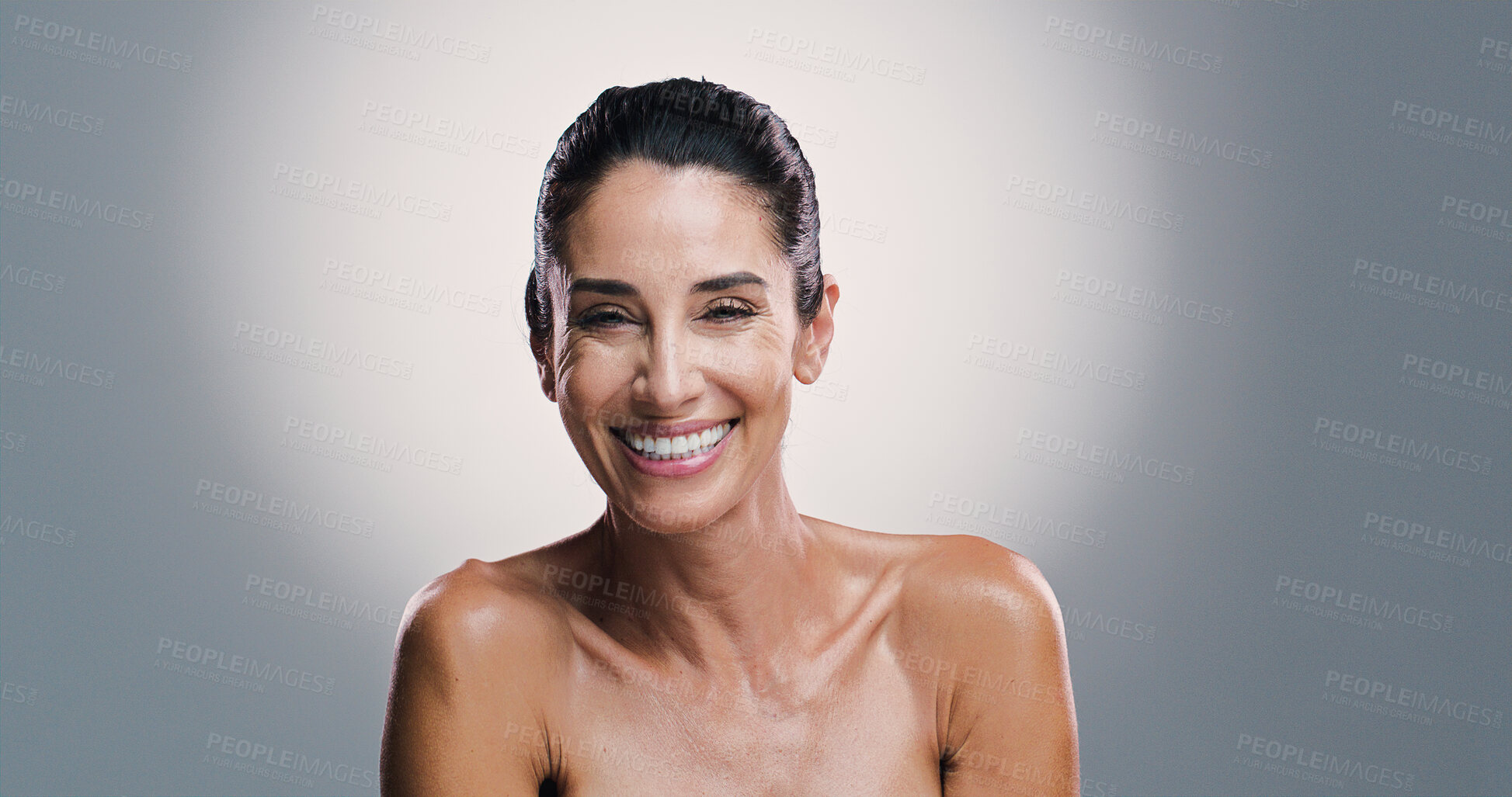 Buy stock photo Skincare, smile and mature woman with glow, studio and treatment for shine of skin, antiaging and cosmetics. Gray background, mockup space and happy for results of dermatology, portrait and wellness