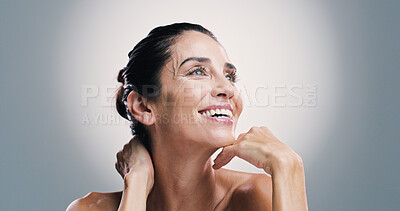 Buy stock photo Skincare, thinking and happy woman with beauty, glow or idea for anti aging treatment. Mature model, natural cosmetic or facial dermatology for self care, wellness or health on gray studio background