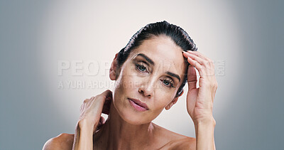 Buy stock photo Aesthetic, beauty and portrait of woman in studio for antiaging treatment or wellness routine. Collagen, dermatology and skincare with mature model on gray background for facial transformation