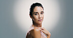 Beauty, portrait and mature woman with skincare, studio and treatment for shine of skin, antiaging and cosmetics. Gray background, mockup space and proud of glow with dermatology, person and wellness