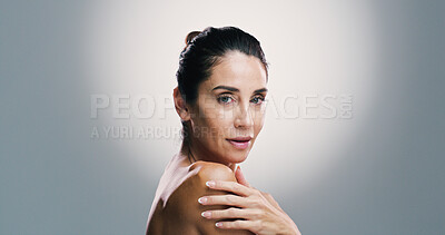 Buy stock photo Portrait, cosmetics and mature woman with skincare, confident and treatment for shine of skin and studio. Gray background, mockup space and glow with dermatology, proud and wellness for person