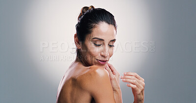 Buy stock photo Smile, woman and skincare beauty in studio for anti aging, treatment and dermatology benefits. Mature person, shoulder and shine of body transformation, natural glow and cosmetics on gray background