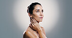 Shine, thinking and woman with beauty, skincare and idea for anti aging treatment. Mature model, natural cosmetics and facial dermatology for self care, glow or health on gray studio background space