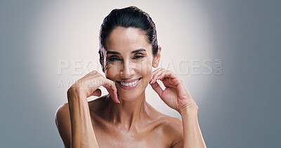 Buy stock photo Portrait, happy and mature woman with skincare, studio and treatment for shine of skin, antiaging and cosmetics. Gray background, mockup space and proud of glow with dermatology, person and wellness
