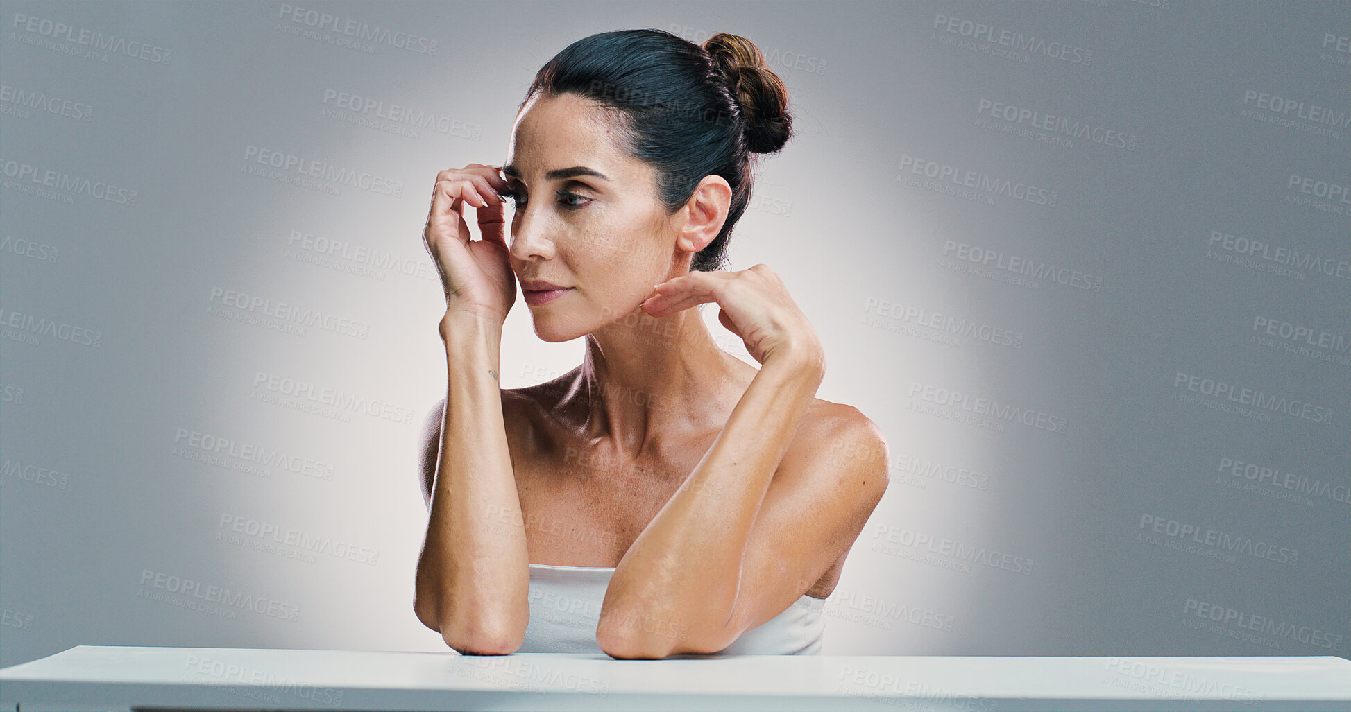 Buy stock photo Thinking, woman and skincare beauty in studio of ideas, anti-aging treatment and dermatology. Mature person, planning and facial transformation, natural glow and cosmetic benefits in white background