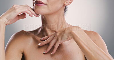 Buy stock photo Cosmetics, hands and wellness of body, studio and treatment for shine of skin, antiaging and skincare for woman. Gray background, model and glow with dermatology for person, beauty and routine