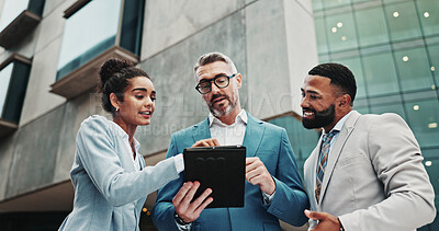 Buy stock photo Collaboration, city and people with tablet, discussion and real estate agent with website for business. Outdoor, colleagues and group with tech for property, reading and teamwork for market trends