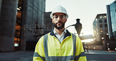 Buy stock photo Man, engineer and portrait in city with helmet for urban expansion, construction and building development. Person, architect and confident in street, project and infrastructure inspection in Colombia