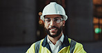 Man, engineer and smile in city with helmet for urban expansion, construction or portrait at night. Person, architect and confidence in street, property and infrastructure inspection in Costa Rica