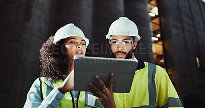 Buy stock photo Woman, man and engineer on tablet at construction site, review and planning for urban expansion in city People, architect and touchscreen app at night, property or infrastructure inspection in Brazil