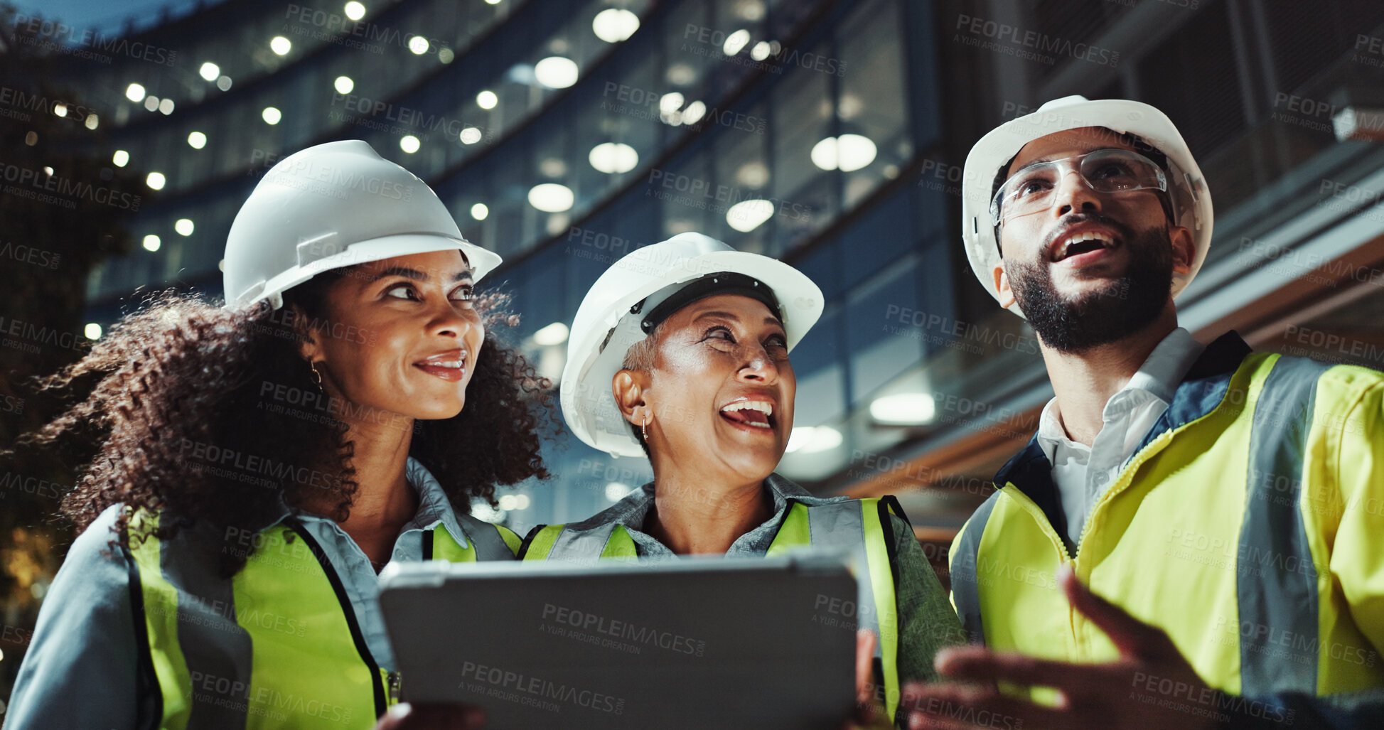 Buy stock photo Night, engineering and people with tablet, smile and conversation with app for inspection. Architecture, teamwork and employees with tech, evening and online planning for building project and below
