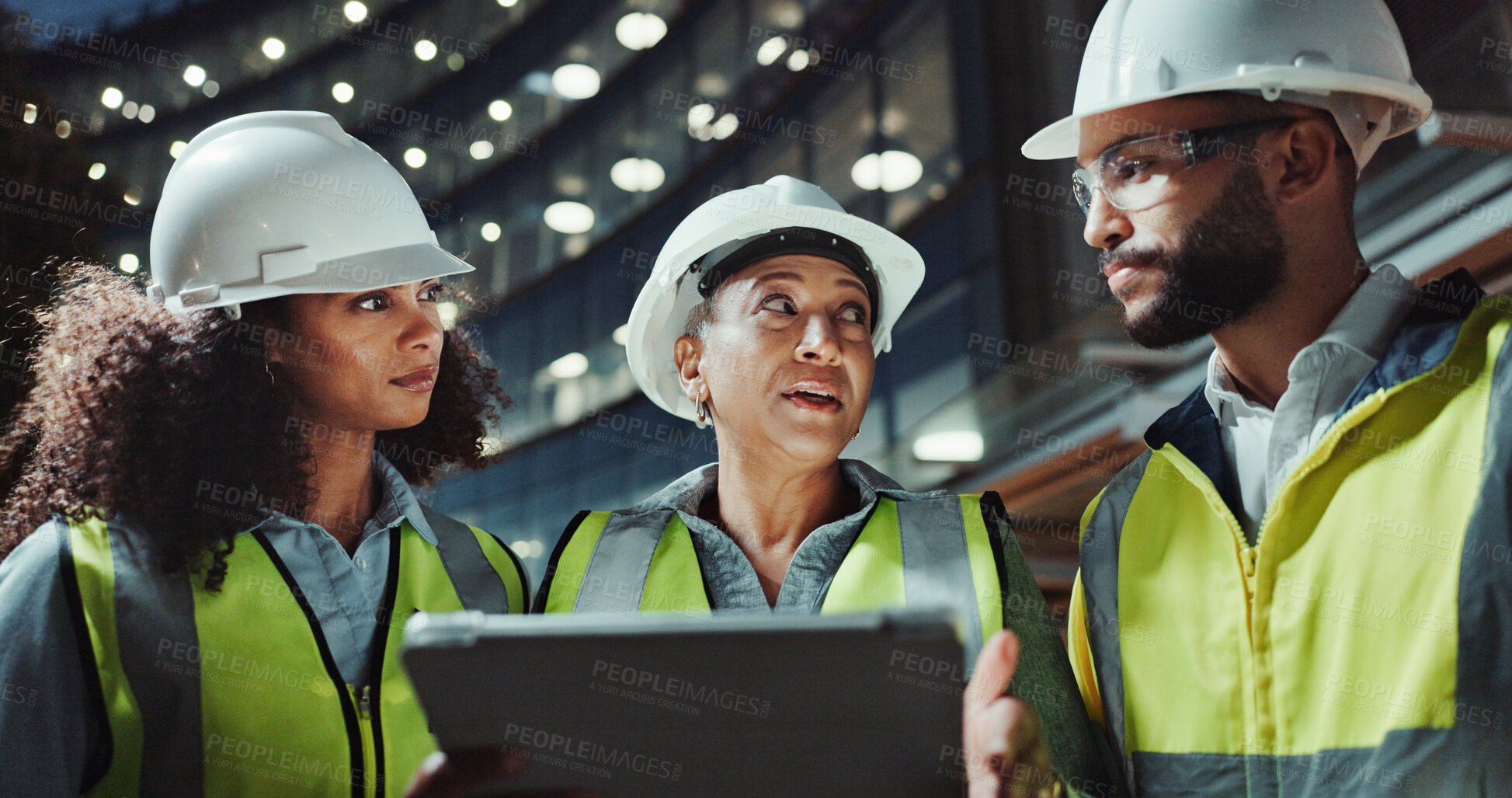 Buy stock photo Night, engineering and people with tablet, talking and conversation with digital app for checklist. Group, safety or employees with tech, evening or online planning for construction and collaboration