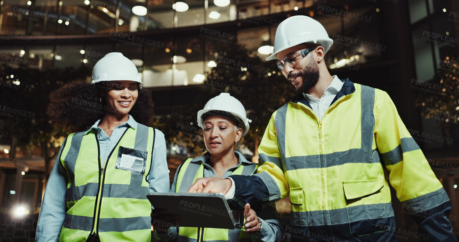 Buy stock photo People, construction worker and tablet with group in city for planning, review and happy with blueprint at night. Women, man and architect with touchscreen, app and building inspection in urban town