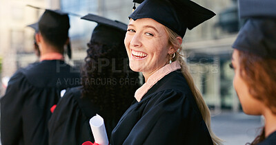 Buy stock photo Graduate, ceremony or portrait of happy woman at university for education, school or success. Queue, graduation or confident student in line at campus with knowledge, smile or college achievement