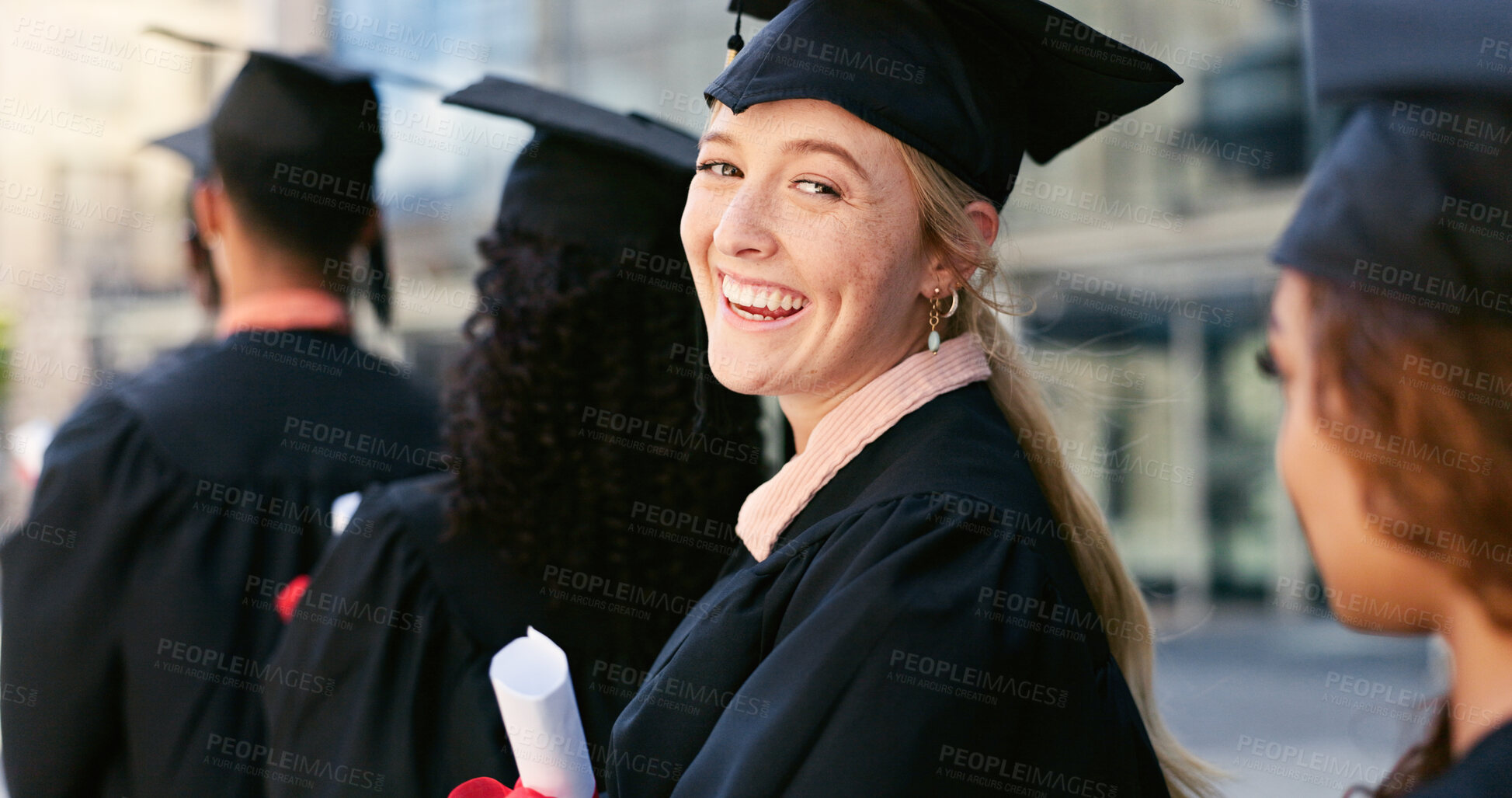 Buy stock photo Graduate, ceremony or portrait of happy woman at university for education, school or success. Queue, graduation or confident student in line at campus with knowledge, smile or college achievement