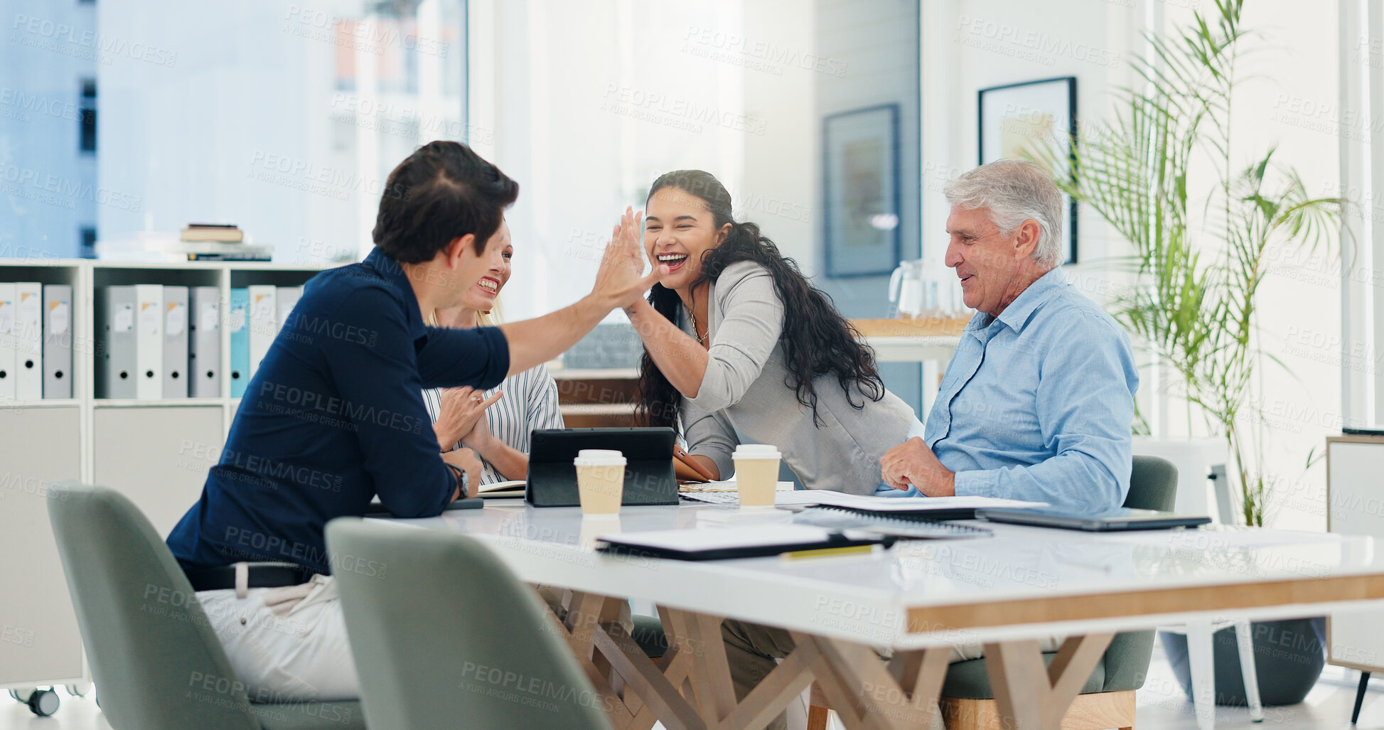 Buy stock photo Success, high five and news with business people in meeting for support, celebration and deal approval. Achievement, funding grant and growth with employees in office for excited, profit and results