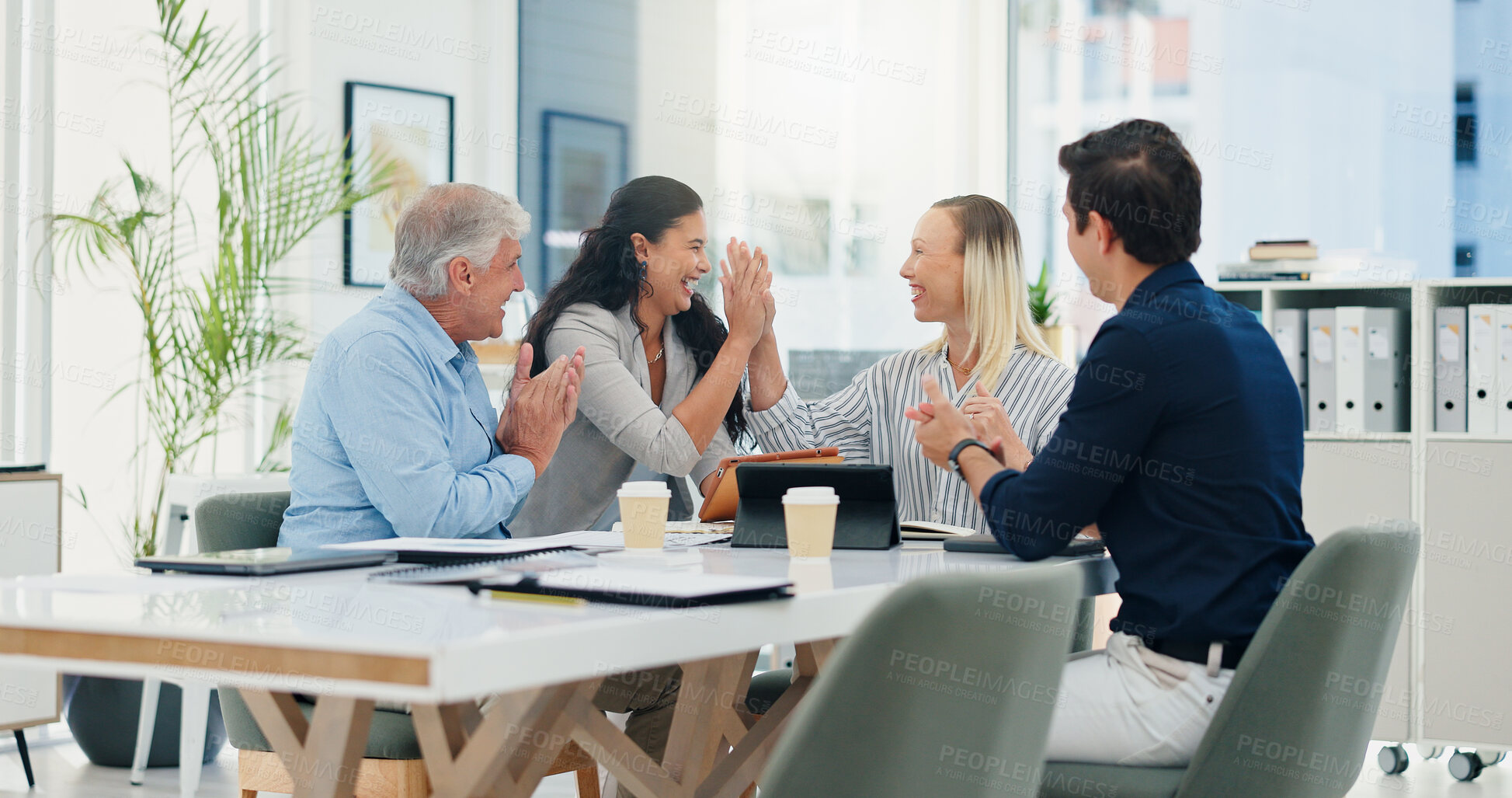 Buy stock photo Success, high five and teamwork with business people in meeting for support, celebration and deal approval. Achievement, funding grant and growth with employees in office for news, profit and results