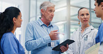 Doctors, group and tablet for hospital management with discussion for funding, planning and review. Director, leader and team with surgeon, nurse and feedback with application at wellness clinic