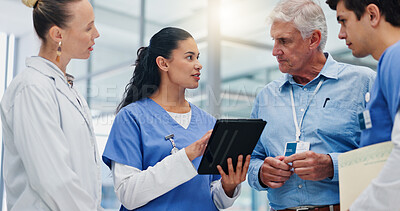 Buy stock photo Woman, doctors and tablet with team at hospital with discussion for funding, management and review. People, leader and group with surgeon, problem solving and feedback with app at wellness clinic