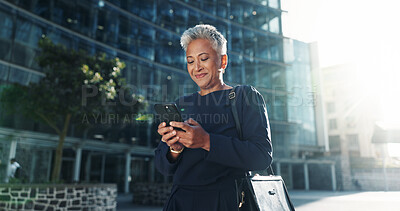 Buy stock photo Texting, phone and business with woman in city for stock market report, reading and investment app. Trader portfolio, communication and client chat with mature person outdoor for mobile or networking
