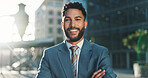 Arms crossed, business and portrait of man in city for commercial real estate or property development. Architecture, buildings and smile with happy employee outdoor in urban town for opportunity