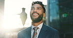 Business, commute and with happy man in city for idea, inspiration or travel. Building, hope and vision with smile of corporate professional outdoor in urban town for opportunity or start of new job