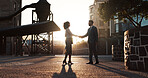 Handshake, meeting and partnership with business people in city for agreement, success and b2b deal. Teamwork, welcome and shaking hands with employees downtown for introduction