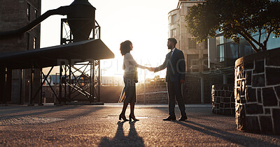 Buy stock photo Handshake, meeting and partnership with business people in city for agreement, success and b2b deal. Teamwork, welcome and shaking hands with employees downtown for introduction