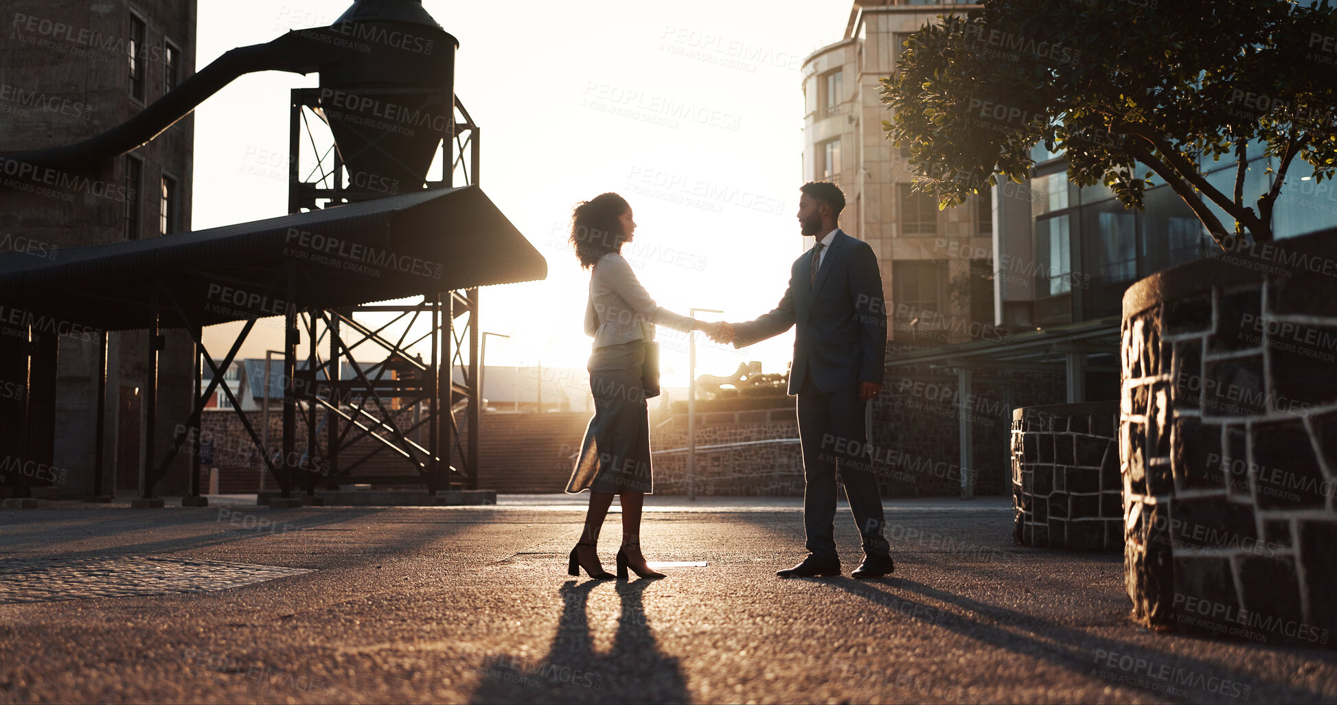 Buy stock photo Handshake, meeting and partnership with business people in city for agreement, success and b2b deal. Teamwork, welcome and shaking hands with employees downtown for introduction