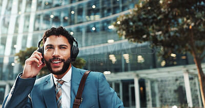 Buy stock photo Headphones, audio and business man in city with morning playlist and streaming radio for travel. Music, outdoor and happy employee listening to song, corporate podcast or thinking of sound on commute