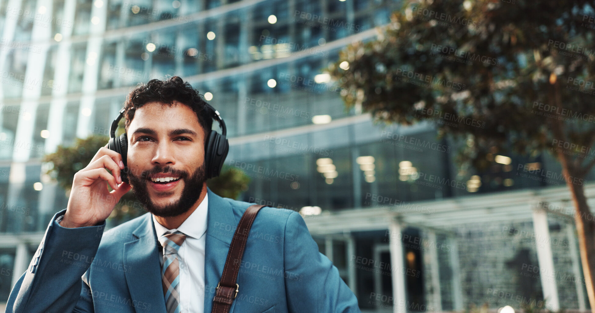 Buy stock photo Headphones, audio and business man in city with morning playlist and streaming radio for travel. Music, outdoor and happy employee listening to song, corporate podcast or thinking of sound on commute