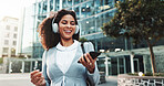 Phone, music and business woman in city with morning media, singing or streaming radio online for travel. Headphones, outdoor and happy employee on mobile for song, urban podcast and sound on commute