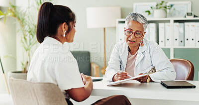 Buy stock photo Checkup, documents or healthcare with doctor and patient in office of hospital for consulting. Clipboard, insurance or medical with mature medicine professional and woman in clinic for treatment