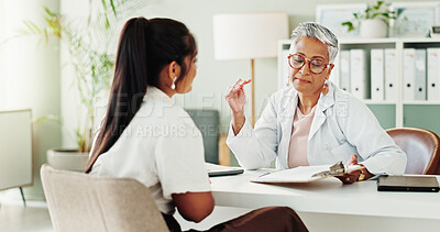 Buy stock photo Appointment, documents or healthcare with doctor and patient in office of hospital for consulting. Clipboard, feedback or medical with mature medicine professional and woman in clinic for treatment