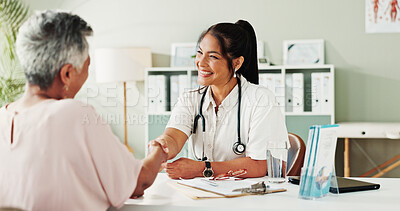 Buy stock photo Checkup, handshake or healthcare with doctor and patient in hospital office for consulting. Appointment, feedback or shaking hands with medical professional and mature woman in clinic for senior care