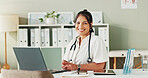 Healthcare, woman and doctor with laptop in portrait, medical diagnosis and information for research. Office, clinic and female cardiologist with digital for telehealth service, prescription or smile
