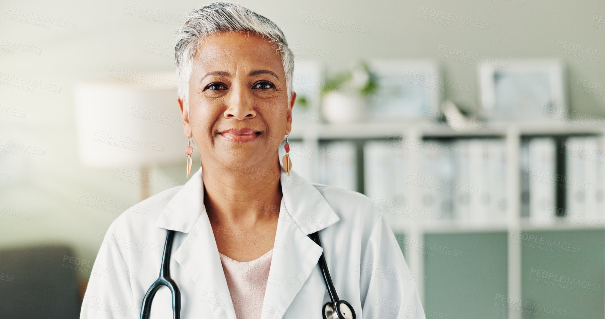 Buy stock photo Mature, doctor or woman with portrait, confidence or healthcare for wellness in clinic. Trust, professional help or person in hospital for career, pharmaceutical medicine or medical service in Mexico