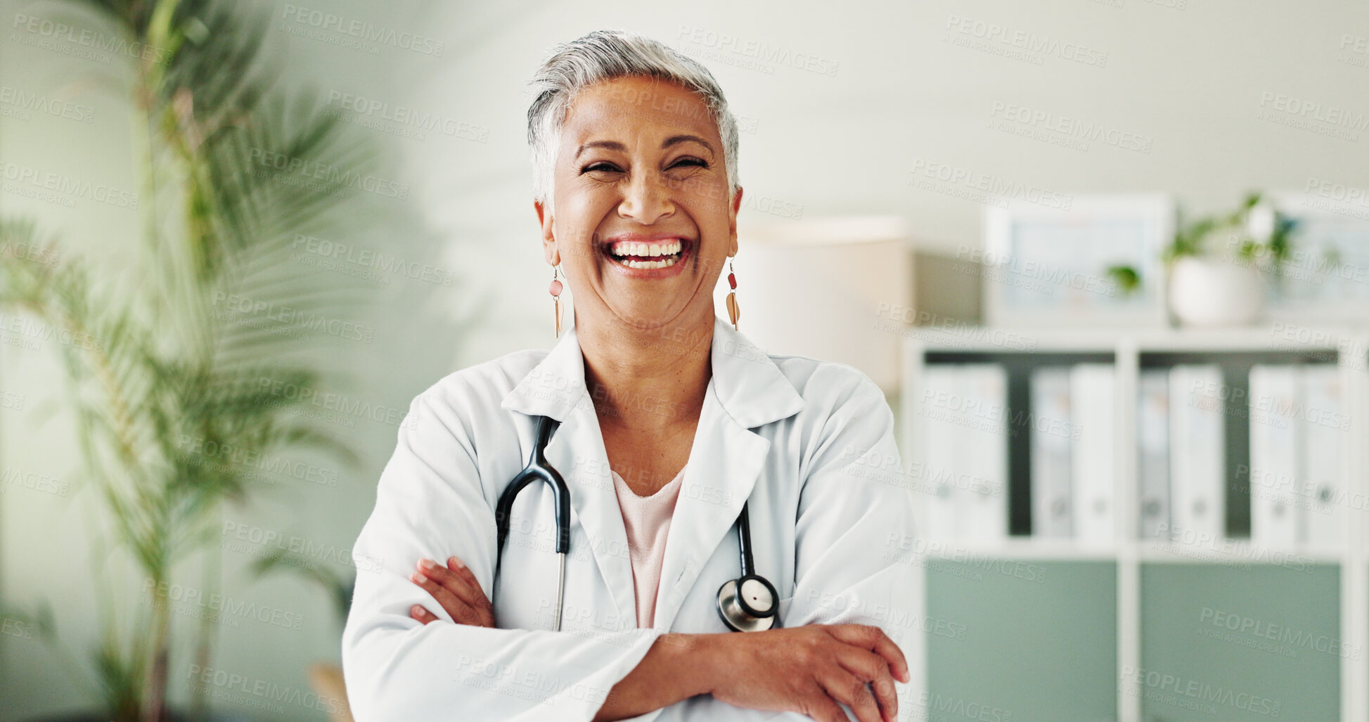 Buy stock photo Portrait, doctor and woman with arms crossed, happy or confident for healthcare in clinic or life insurance. Hospital, medical professional and mature person with smile for career, internist or proud