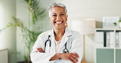Buy stock photo Confident, doctor and mature woman with arms crossed, portrait and smile for healthcare in clinic or life insurance. Hospital, medical professional and happy person with pride for career or internist