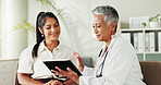 Smile, women and doctor on tablet in office for good news, research and online results of diagnosis. People, digital and consultation of healthcare, insurance checklist and treatment plan and medical
