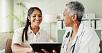 Happy, women and doctor on tablet in office for good news, research and online results of diagnosis. People, digital and consultation of healthcare, insurance checklist and treatment plan and medical