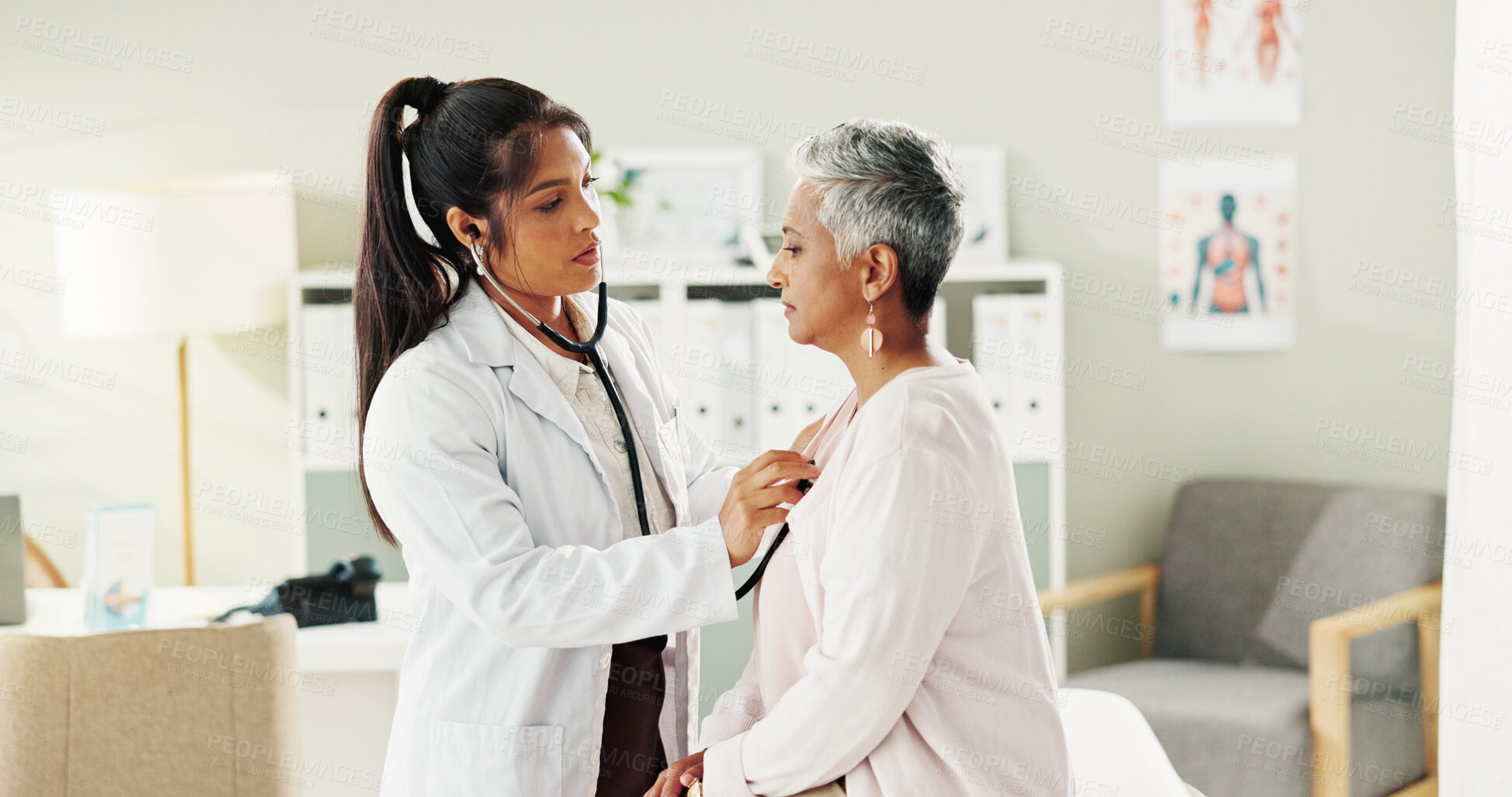 Buy stock photo Doctor, stethoscope and senior woman in office for cardiology, listen to heartbeat and healthcare exam. People, evaluation and check breathing, cardiovascular sound and diagnosis for medical services