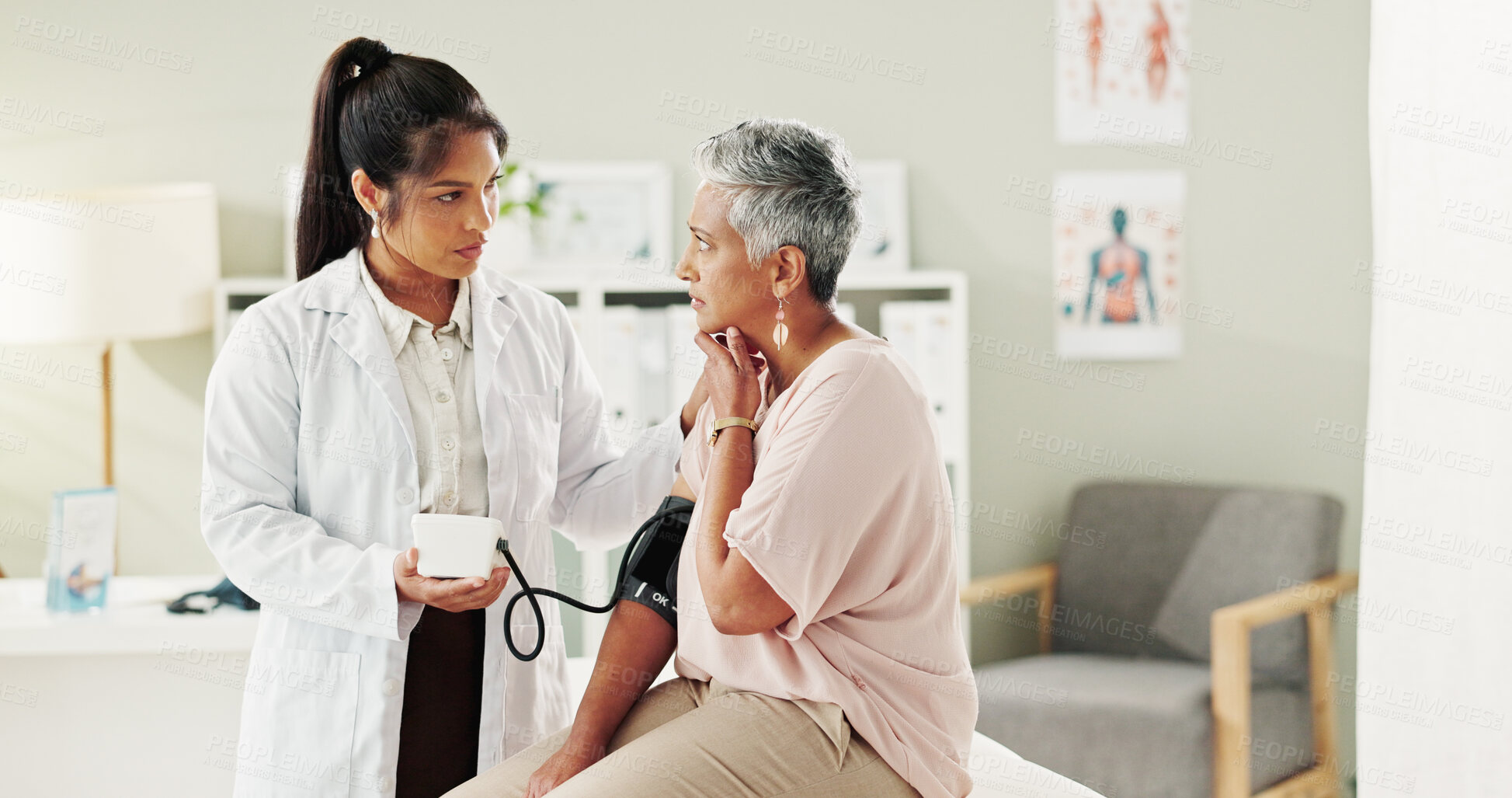 Buy stock photo Blood pressure, consultation or doctor with mature patient for exam, healthcare and care in nursing home. Test, support and senior woman with medical professional for health check or advice in office