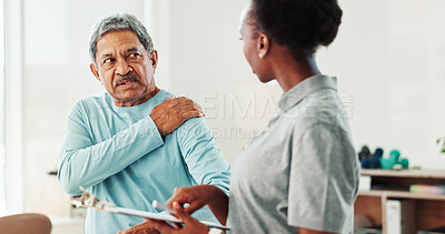 Buy stock photo Physiotherapist, woman and senior man with shoulder pain, checklist and questions at clinic. People, discussion and clipboard for injury with exercise, advice and assessment for wellness at hospital