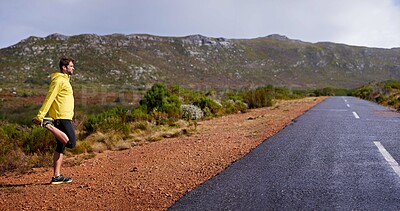 Buy stock photo Male runner, stretch and rural road for warm up, running and fitness outdoor in nature with mountain. Active man or athlete in quiet environment for physical recreation and exercise on mockup     