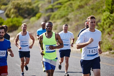 Buy stock photo Marathon, race and running group in road for wellness competition, endurance challenge and healthy body. Men, sports runner and cardio workout with performance, contest energy or exercise for fitness