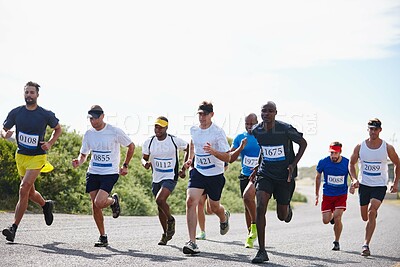 Buy stock photo Marathon, speed and running group in road with competition pace, endurance challenge or fitness. Sports, men runner and cardio exercise with race, performance and contest for wellness or mockup space