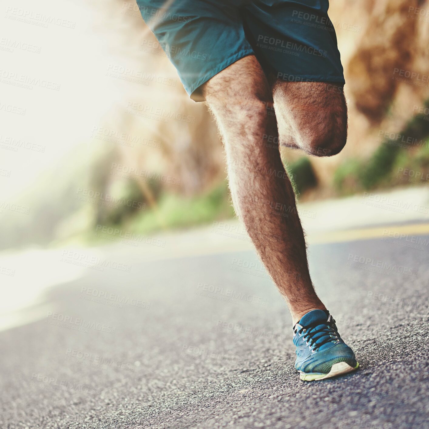 Buy stock photo Running, fitness and legs of man in street for exercise, training and race for workout. Mountain, sports and shoes of person for wellness, health and active for performance, challenge and marathon