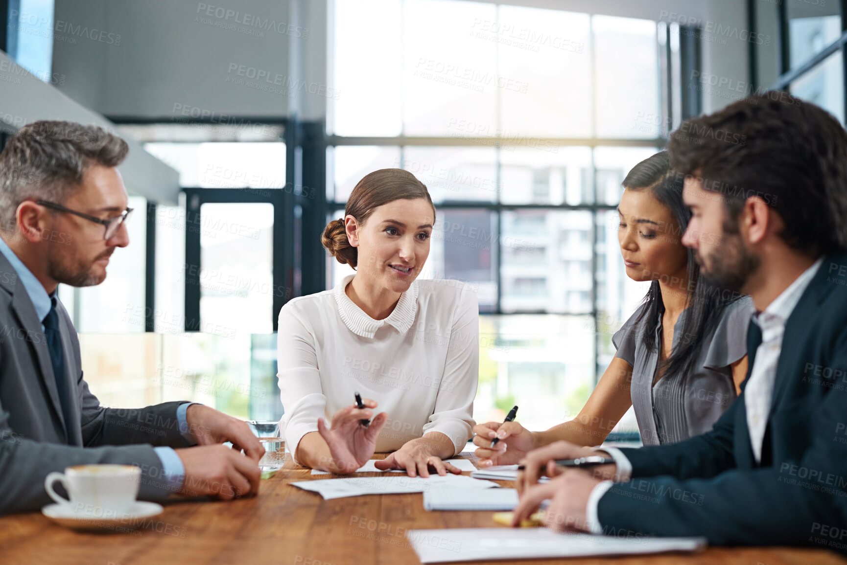 Buy stock photo Corporate, business and meeting in workplace for planning, project and international company. Collaboration, diversity and people at desk for paperwork, executive and conference for discussion.